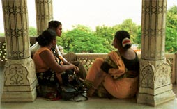 Women resting between the cool marble