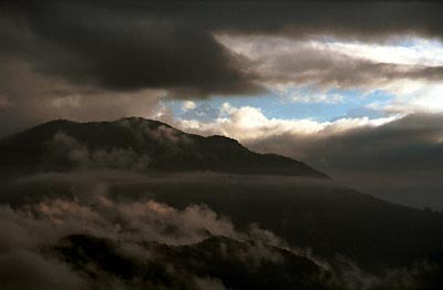 Glimpse of the Himalaya through the clouds around Sarangkot. Click here!